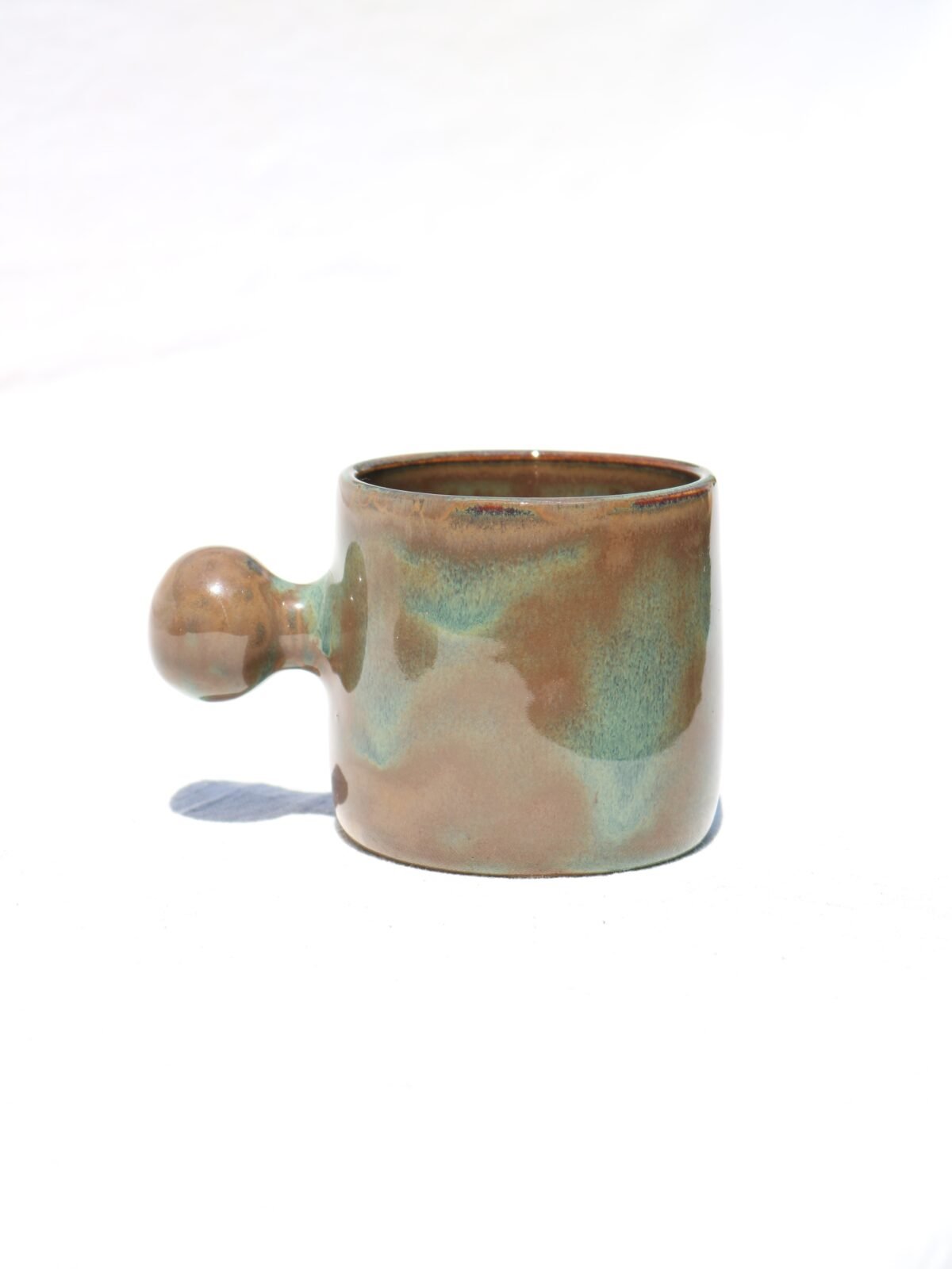 Taza oxide button